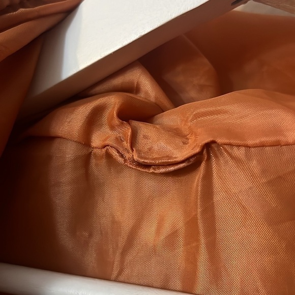 Unbranded orange puffer vest pit to pit 19”
Length 32” - Picture 8 of 8